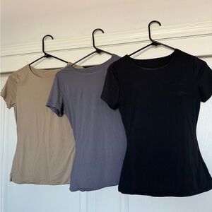 Set of 3 soft buttery tees. XS. Stretchy, double lined.